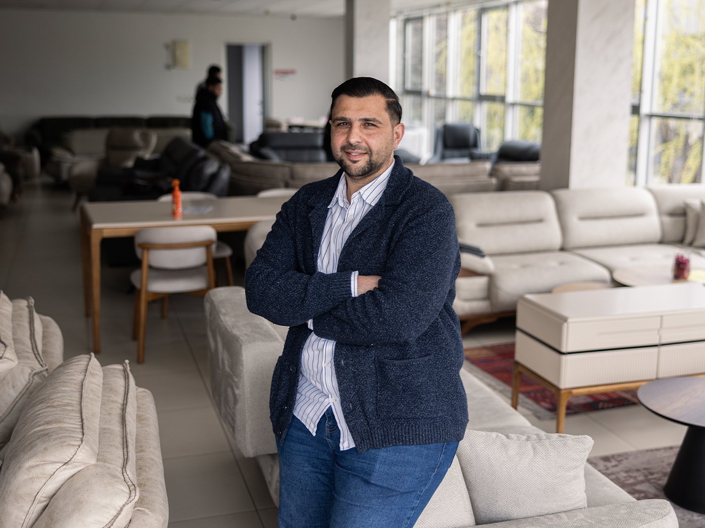 Enis Aziri in his furniture store in Shuto Orizari in Skopje, North Macedonia. Photos: Akos Stiller