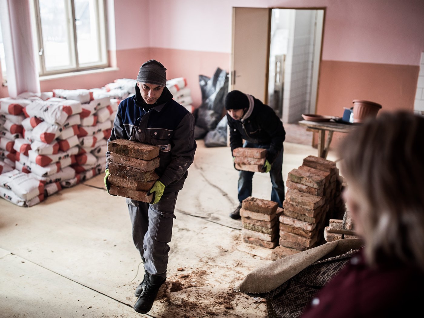 Roma workers on a construction site